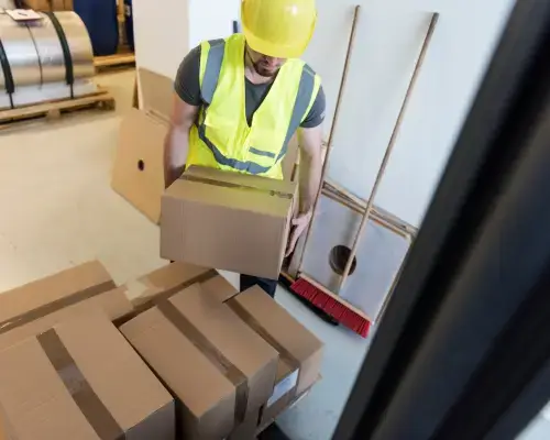 person lifting a package